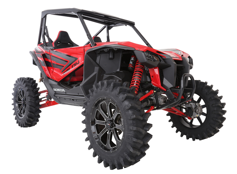 System 3 Off-Road ST-4 wheels mounted on a Honda Talon.